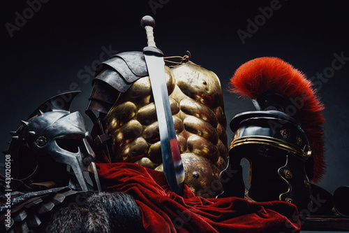 Slika na platnu Gladius and bronze armor with two helmets