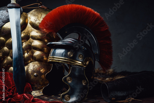 Fototapeta Close up shot of military roman armor and helmet