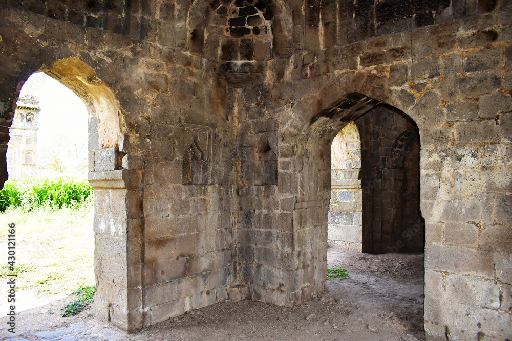 Corridor arches built with basalt stone entrance Gate of Bagh Rauza,  B Built by King Nizami in the 16th century. Ahmednagar, Maharashtra, India.
