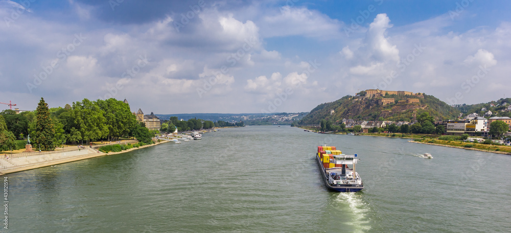Naklejka premium Panorama of a cargo ship on the river Rhine near Koblenz, Germany