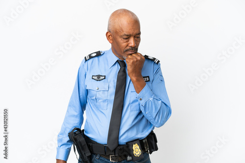 Young police man isolated on white background having doubts