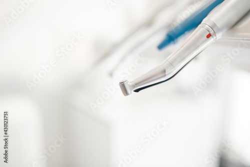 Closeup of a modern dentist tools  burnishers with blurred background