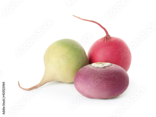 Different fresh ripe turnips on white background