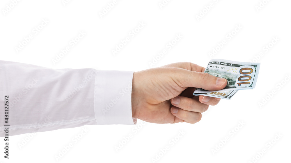 The hand of a man giving $100, isolated on a white background The hand of a man giving $100, isolated on a white background