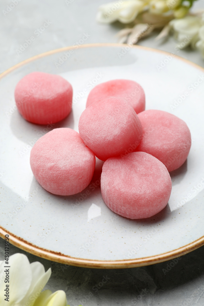 Delicious mochi on plate, closeup. Traditional Japanese dessert Delicious mochi on plate, closeup. Traditional Japanese dessert