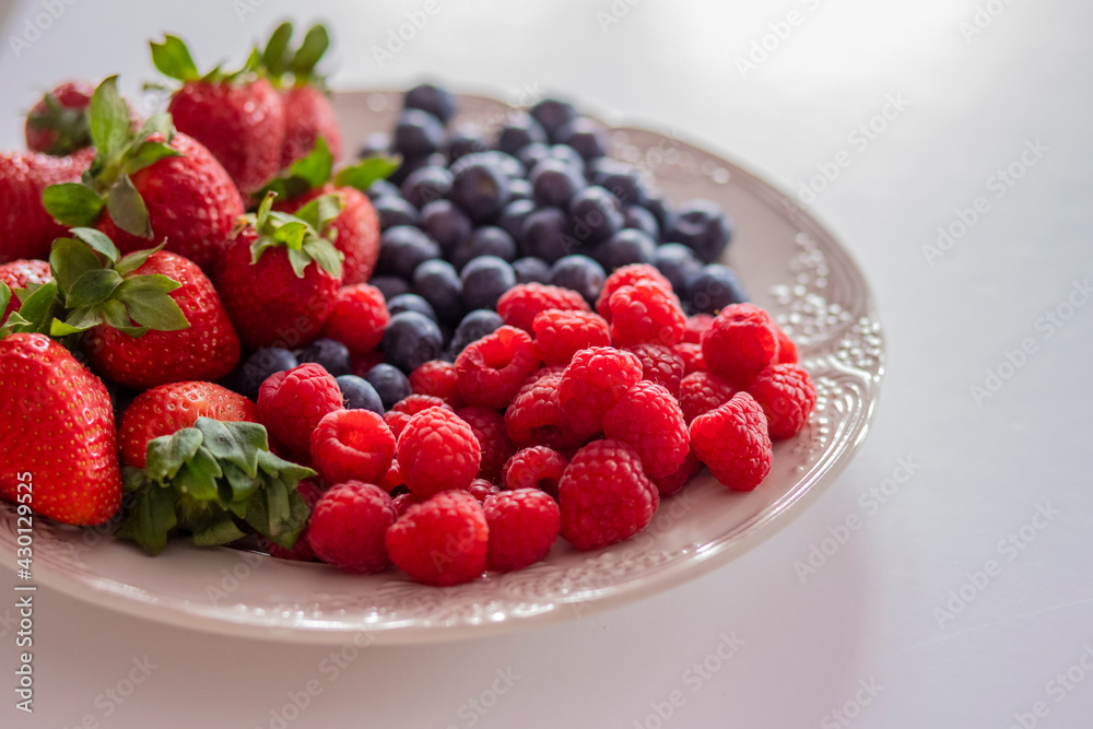fresh ripe juicy wild berries raspberries and blueberries
fresh ripe juicy wild berries raspberries and blueberries