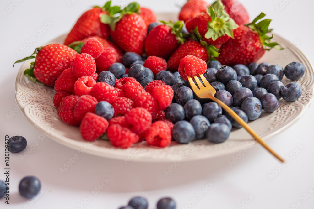 fresh ripe juicy wild berries raspberries and blueberries
fresh ripe juicy wild berries raspberries and blueberries