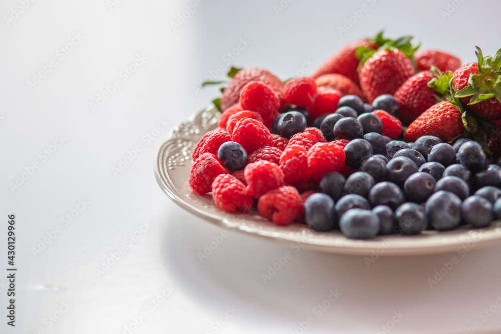 fresh ripe juicy wild berries raspberries and blueberries
fresh ripe juicy wild berries raspberries and blueberries