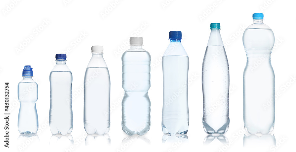 Naklejka premium Set with different bottles of pure water on white background. Banner design