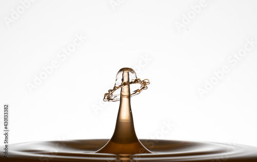 Water drop collision on white background