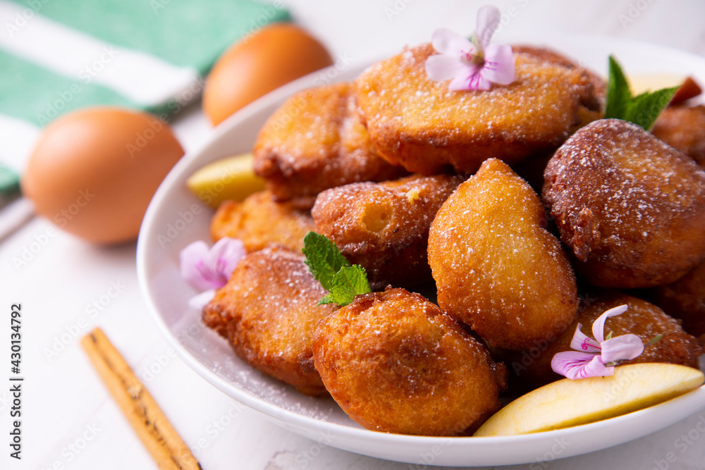 Fried buñuelos with ricotta cheese and apple. Fried buñuelos with ricotta cheese and apple.