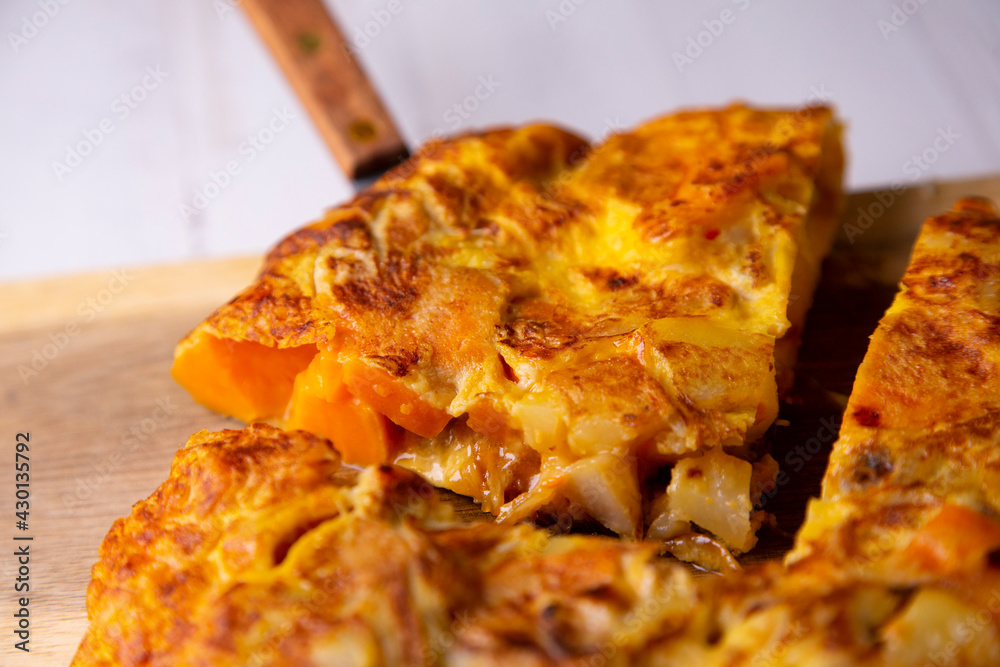 Spanish omelette with cheese, potatoes and sweet potato Spanish omelette with cheese, potatoes and sweet potato