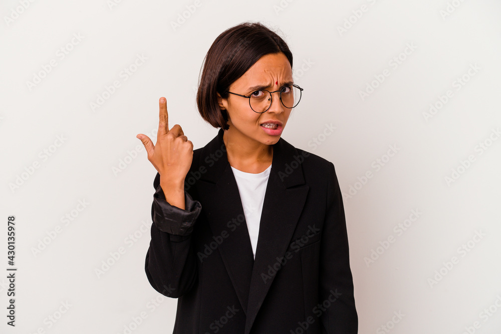 Young business Indian woman isolated on white background showing a disappointment gesture with forefinger. Young business Indian woman isolated on white background showing a disappointment gesture with forefinger.