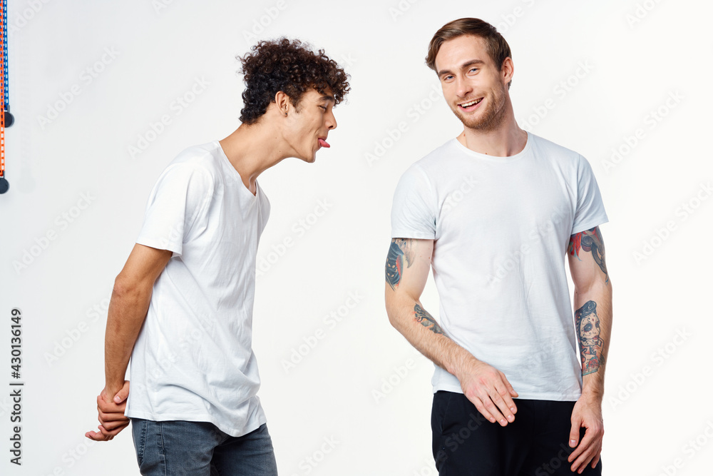 emotional men in white t-shirts antics fun isolated background emotional men in white t-shirts antics fun isolated background