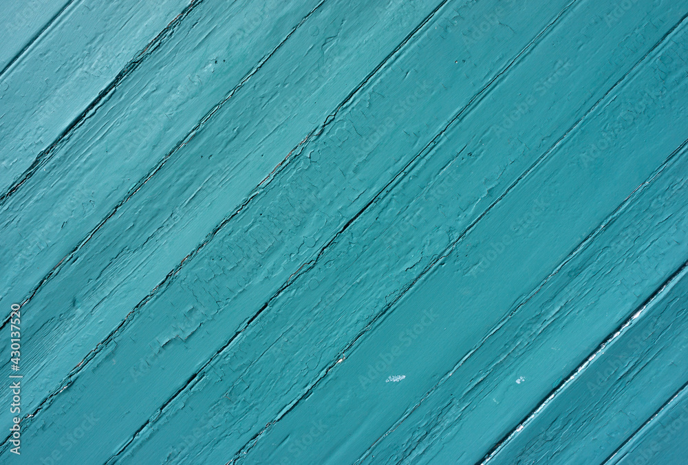 Obraz premium Wide view of old boards at an angle painted green