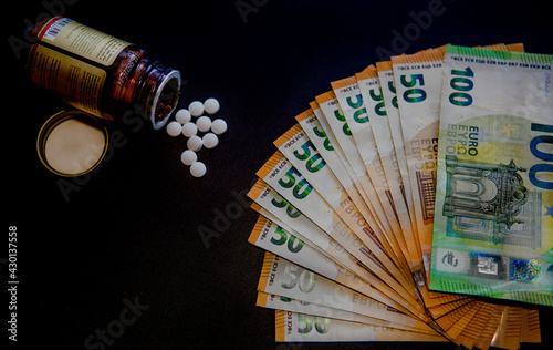 money euro and pills 