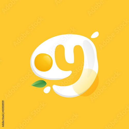 Letter Y logo on a Fried Egg with green leaf and splashes.