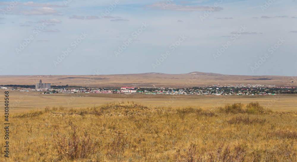 Fototapeta premium The view from the height of the village of Taskala, WKO, Kazakhstan, the village of Taskala (Tasqala, Kamenka), mountain Ichka