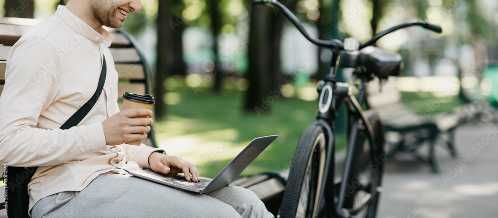 Freelancer outdoor and workplace in park during social distancing and covid-19 outbreak Freelancer outdoor and workplace in park during social distancing and covid-19 outbreak