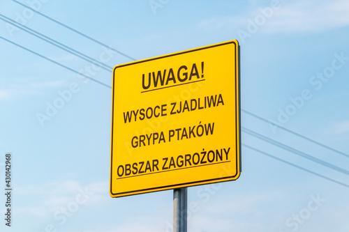 Avian influenza risk area in Polish language information board.