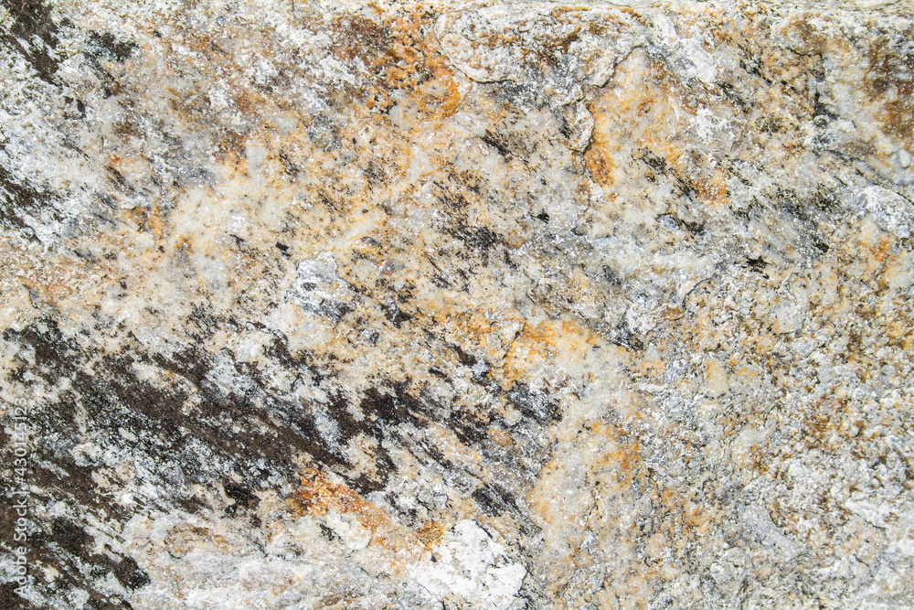 Colorful granite stone texture. Abstract stone wall background. Close up. Copy space Colorful granite stone texture. Abstract stone wall background. Close up. Copy space