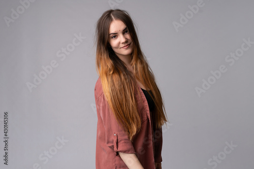 Young caucasian woman posing in studio