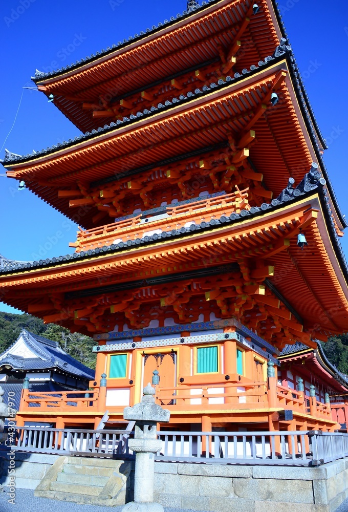 The Buddhist temple of Kiyumizudera stands on the waters of the Otowa waterfall, in spring surrounded by cherry and maple trees in bloom. Its name means Pure Water Temple. The Buddhist temple of Kiyumizudera stands on the waters of the Otowa waterfall, in spring surrounded by cherry and maple trees in bloom. Its name means Pure Water Temple.