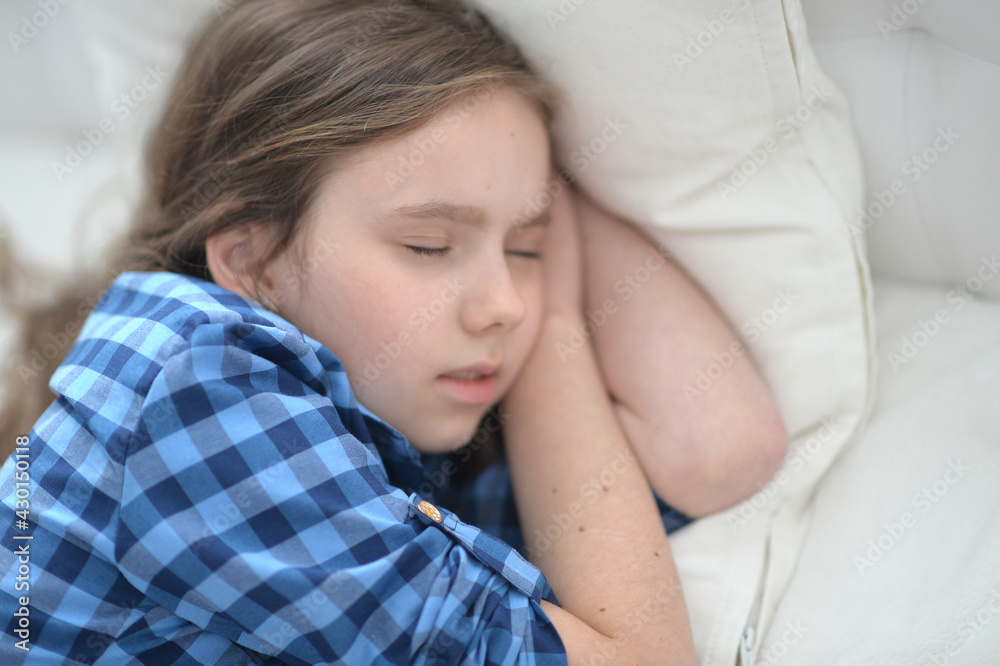 Cute little girl sleeping in bed at home Cute little girl sleeping in bed at home