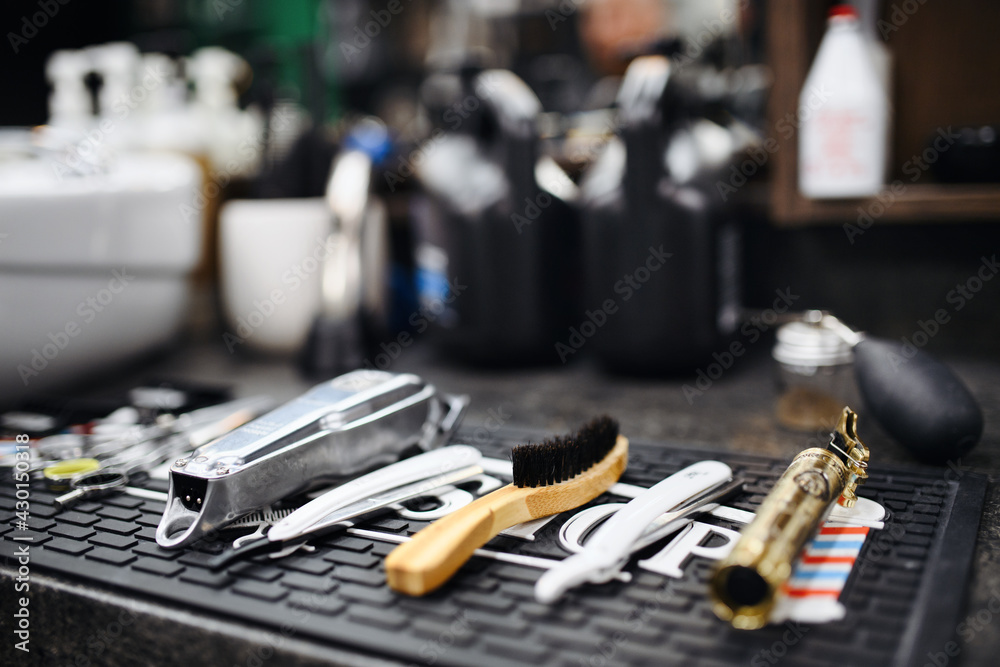 Fototapeta premium Shaving accessories and tools in barber shop.