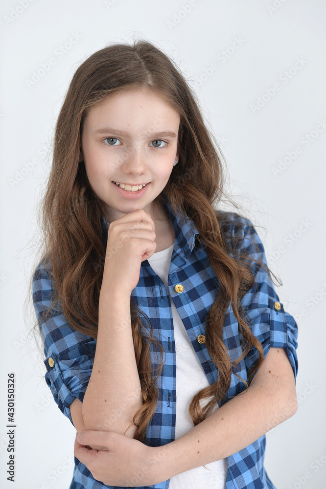 Cute girl looking at camera isolated on white background Cute girl looking at camera isolated on white background