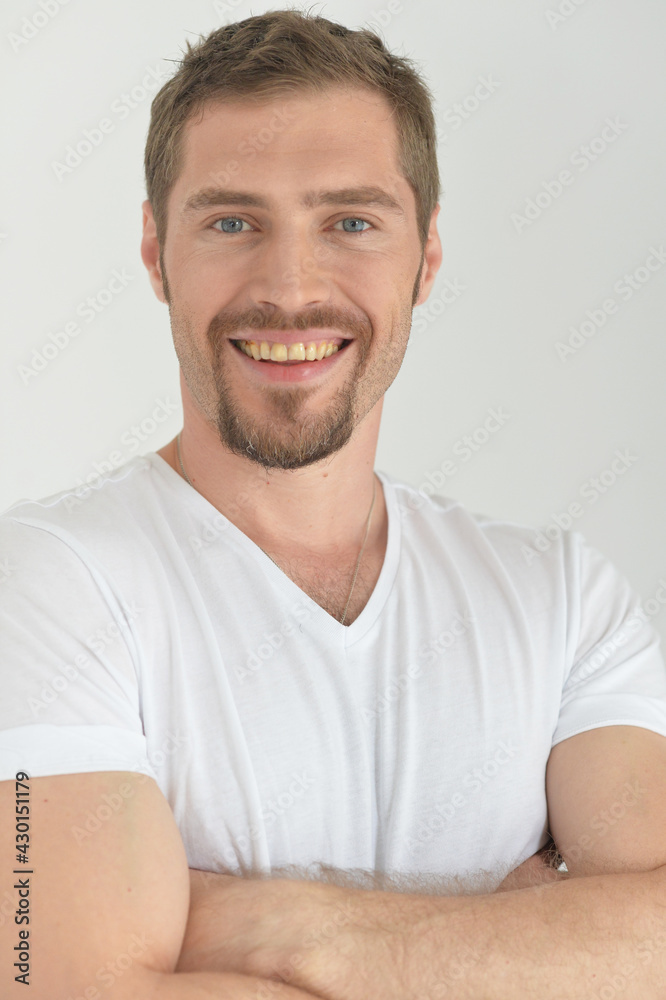 Portrait of handsome young man posing in studio Portrait of handsome young man posing in studio