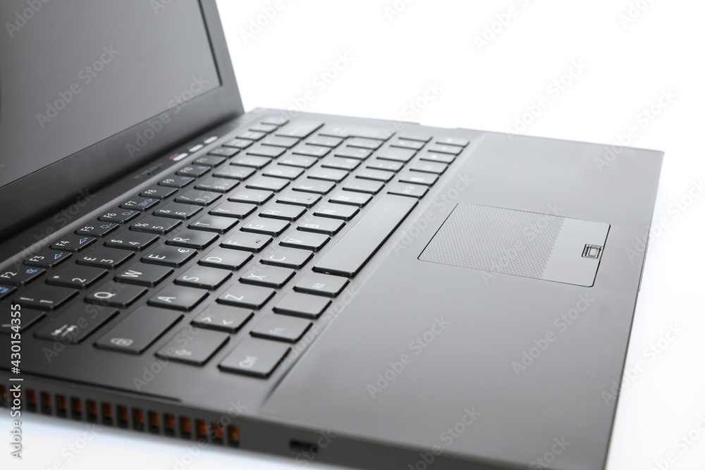 close up on notebook keyboard on white background close up on notebook keyboard on white background