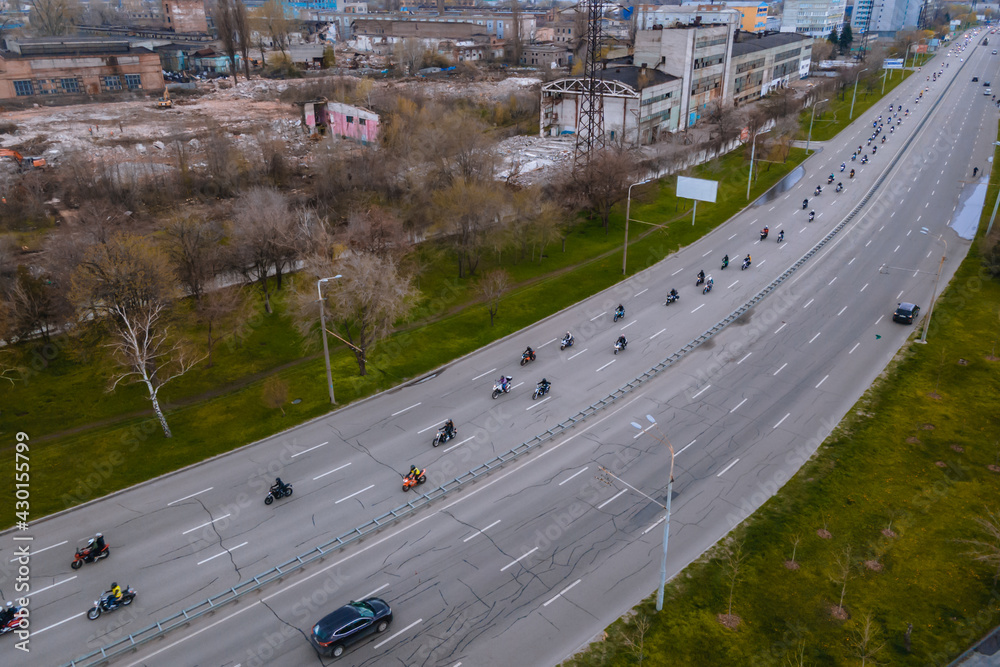 A column of bikers drove through the city and opened the motorcycle season. Drone photos