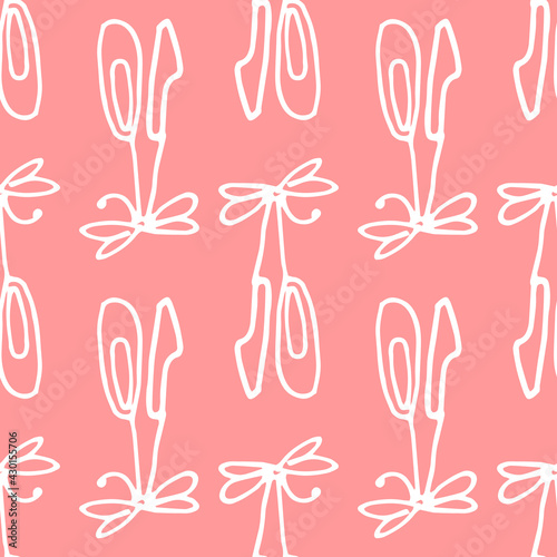 a pattern of a pair of ballet flats on a ribbon with a white line on a pink background. Seamless pattern of children's pointe shoes tied with a bow hand drawn in doodle style with a white line on a pa
