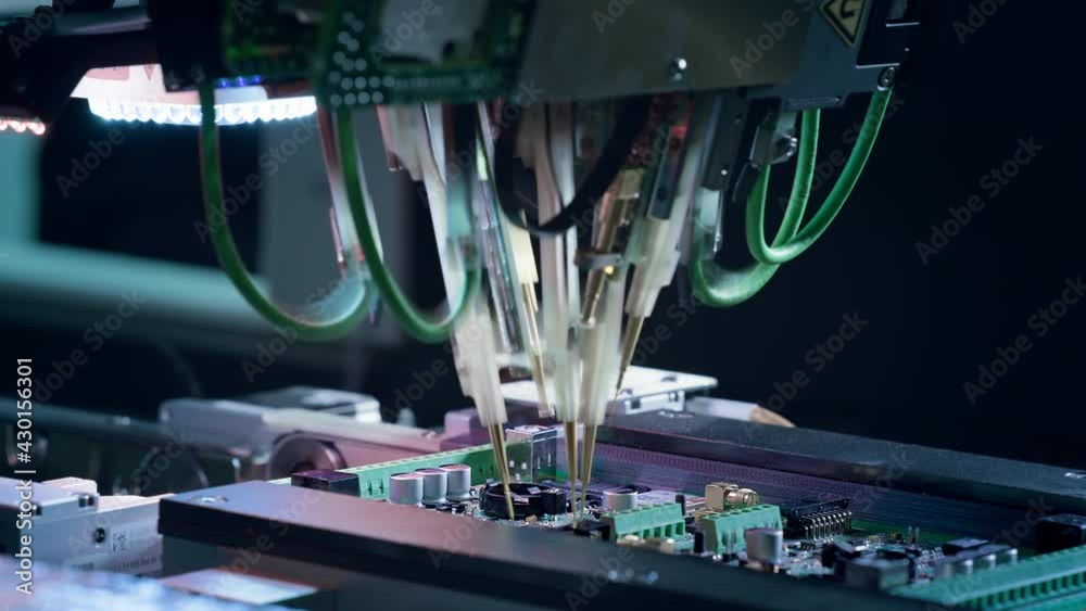 Electronic circuit boards production and installation of SMD components. Needle automatic equipment diagnose and test chips and processors. Manufacture of electronic chips. High-tech, close-up