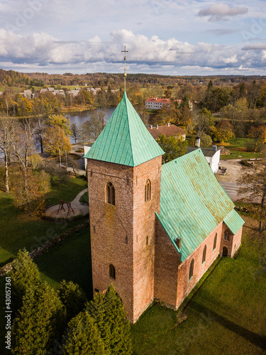 Aerial view of Edole lutheran church in sunny autumn day, Latvia. photo