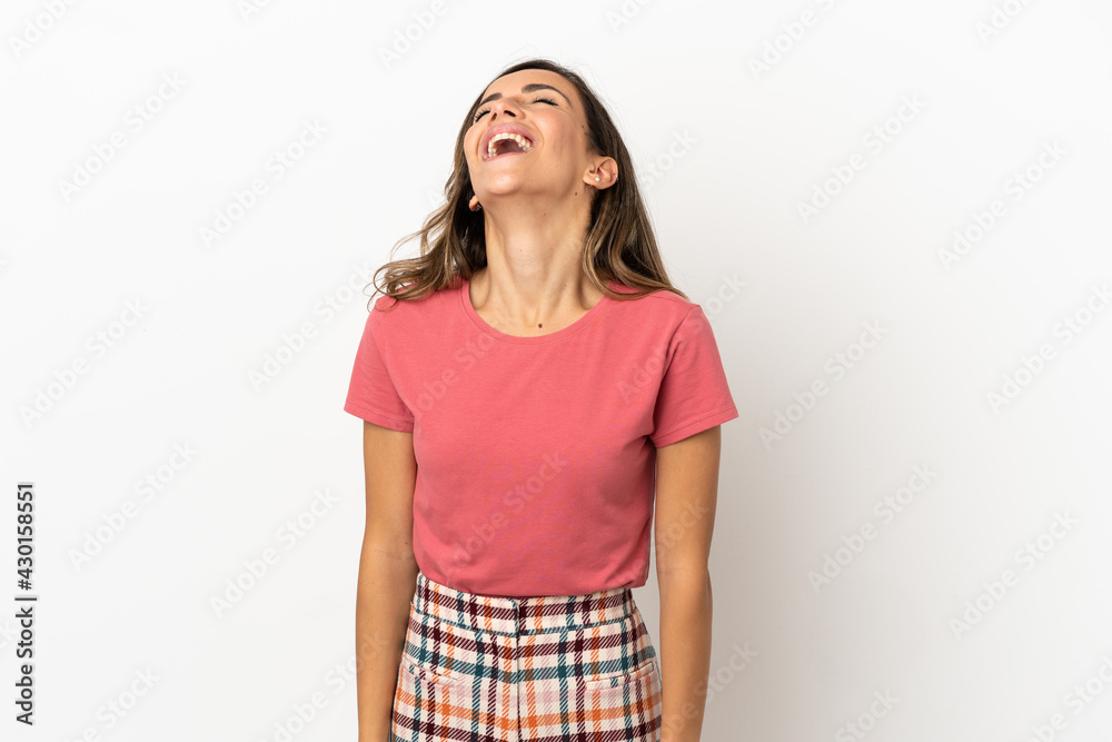 Young woman over isolated background laughing Young woman over isolated background laughing