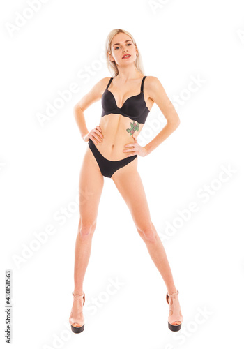 Full body portrait of a young beautiful blonde woman