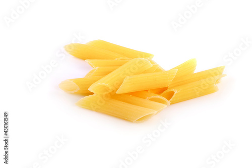 Penne rigate pasta pile isolated on white background