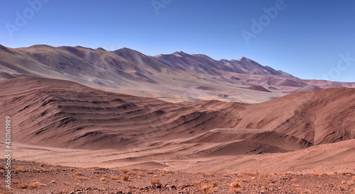 panoramic view of the desolate mountain landscape in the vicinity of Tolar Grande on the high altitude puna in northwest Argentina
