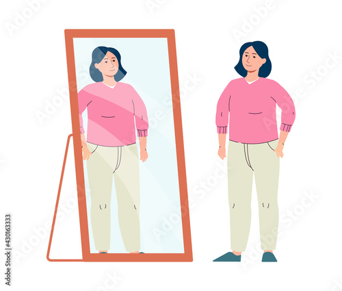 Woman brunette with positive self acceptance and esteem look on her in mirror.