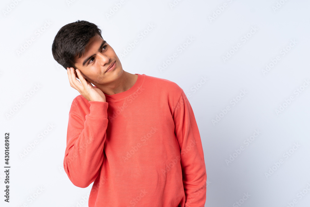Handsome man over isolated blue background thinking an idea Handsome man over isolated blue background thinking an idea
