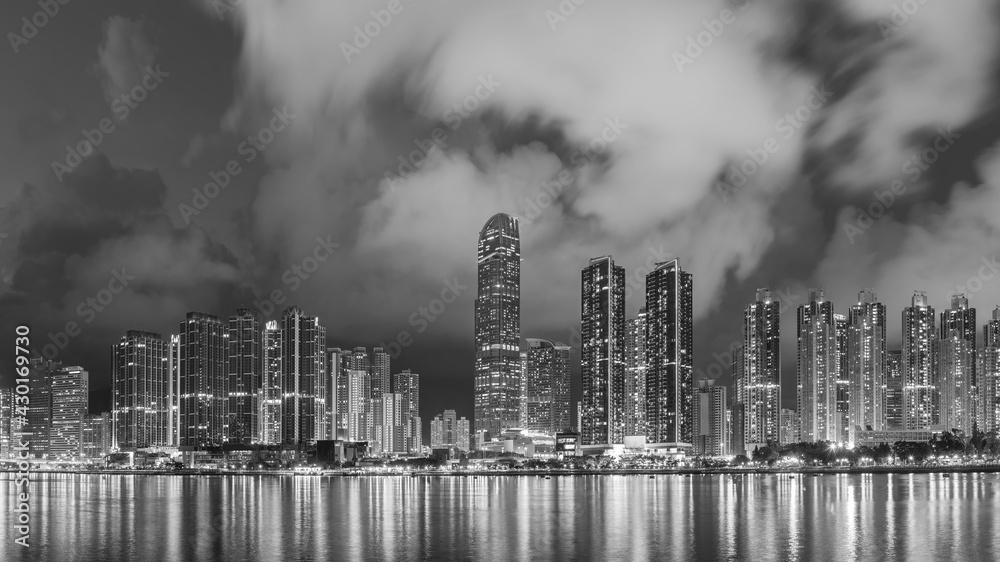 Panorama of skyline and Harbor of midtown of Hong Kong city at dusk