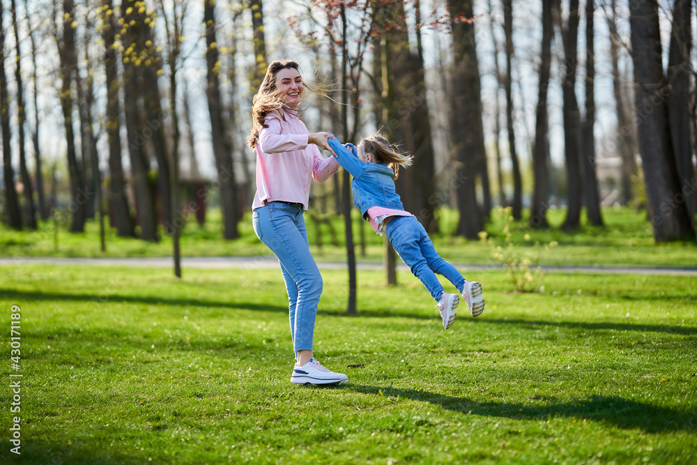 Mother and daughter in the park Mother and daughter in the park