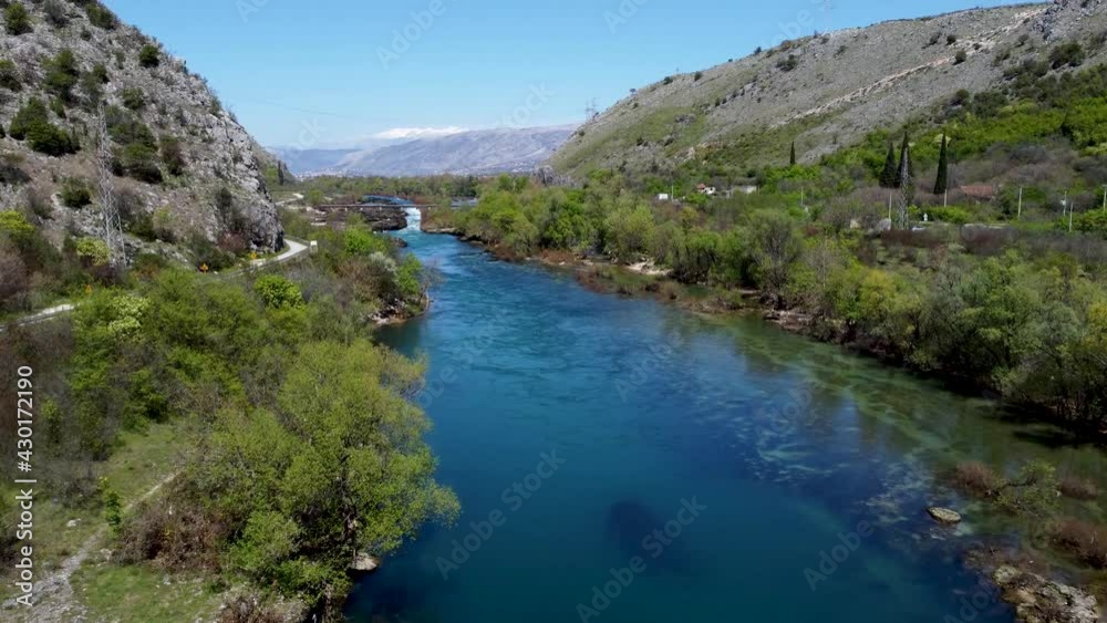 Aerial drone view of river in canyon. Mountain river flowing, view from above. Neretva river in Bosnia and Herzegovina. Aerial drone view of river in canyon. Mountain river flowing, view from above. Neretva river in Bosnia and Herzegovina.