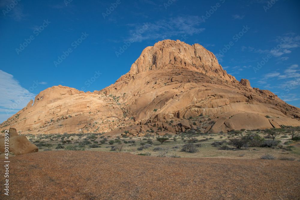 Fototapeta premium Mount Spitzkoppe, formed when part of a giant volcano collapsed, resulting in many interesting and bizarre rock formations