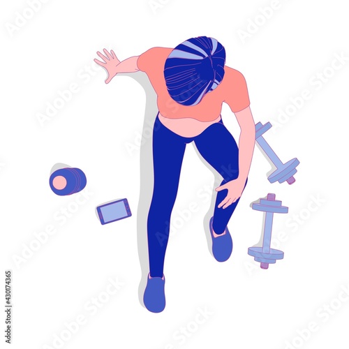 Sporty young woman sit on floor with dumbells.