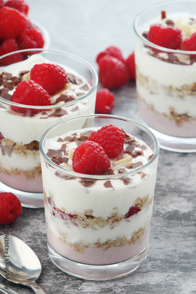 Granola with yogurt trifles with raspberry