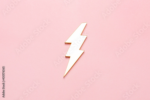 Free Download Lightning bolt set isolated on pink. Gold with silver margin. - GFXLoad