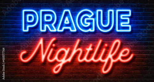 Neon sign on a brick wall - Prague Nightlife